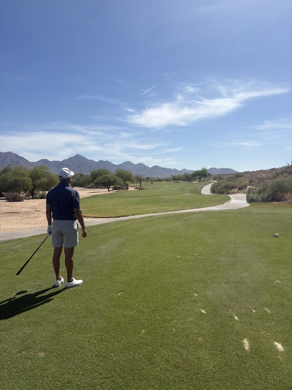 A golf round under open sky